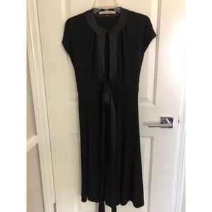 Black Dress w/ slit in the middle of chest